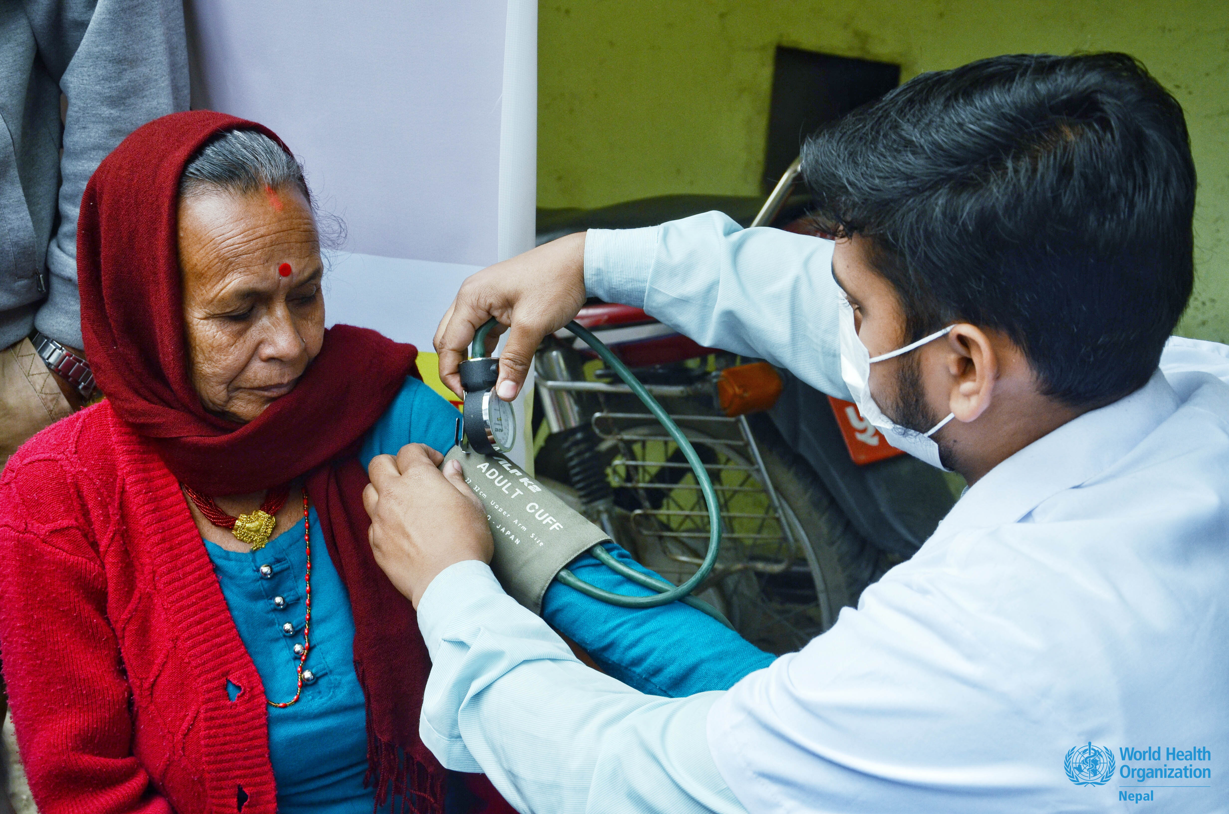 6.  An elderly service seeker getting her blood pressure checked at the 'UHC Day 2019 Health Scree